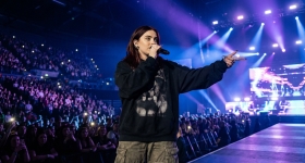 Billie Eilish performing live on stage at the OVO Hydro Arena in Glasgow