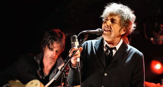 Bob Dylan performing live on stage at the Lotto Arena in Antwerp
