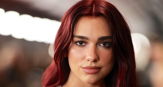 Dua Lipa performing live on stage at Estadio GNP Seguros in Mexico City