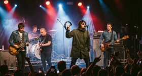 Oasis performing live on stage at Croke Park in Dublin